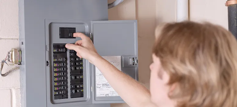 Home electrical circuit breaker panel showing a tripped breaker switch, a common cause of a microwave that won&rsquo;t turn on